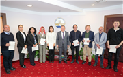 UNVANLARINDA YÜKSELEN AKADEMİSYENLERE BELGELERİ VERİLDİ 