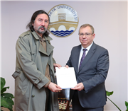 ÖĞRETİM ÜYELİĞİNE ATANAN AKADEMİSYENLERE BELGELERİ TAKDİM EDİLDİ