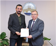 ÖĞRETİM ÜYELİĞİNE ATANAN AKADEMİSYENLERE BELGELERİ TAKDİM EDİLDİ