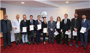 ÖĞRETİM ÜYELİĞİNE ATANAN AKADEMİSYENLERE BELGELERİ TAKDİM EDİLDİ